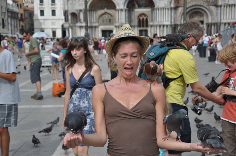 Nikki looking happy to have pigeons on her