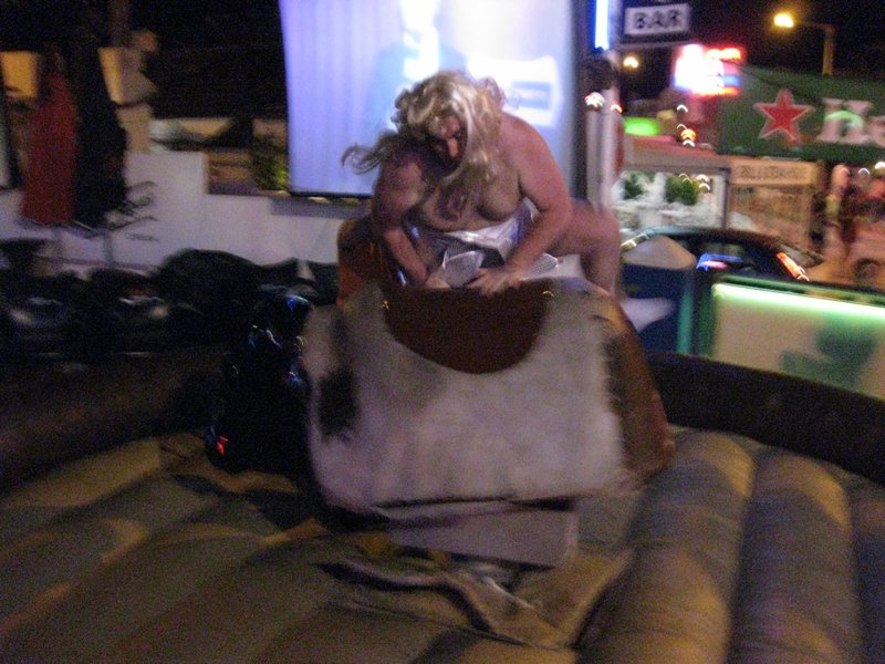 Peter trying to get on the mechanical bull