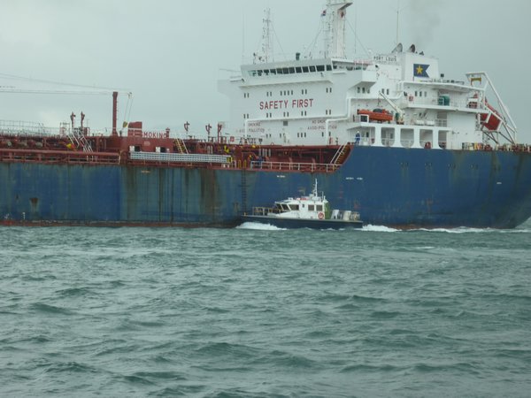 A Pilot Boat on the Side of a Cargo Ship