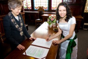 Paula signing the certyficate