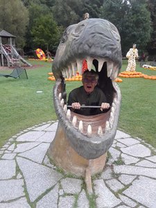 JC inside a dinosaur's mouth