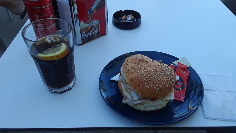 My monster, delicious hamburger at the café next to the Albergue 