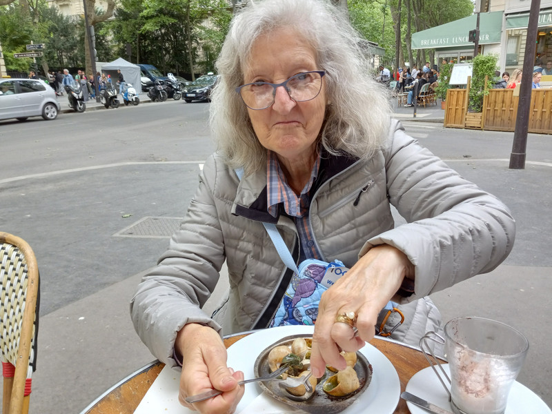 Manoli eating her escargottes (snails!)