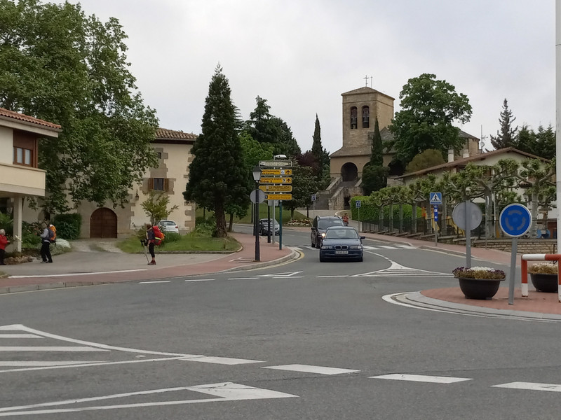 The Familia Roncal albergue and a church in Cizur Menor