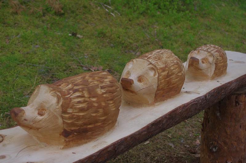 Hand-carved hedge hogs