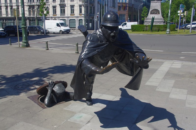 Neat statue near a City Sightseeing bus stop