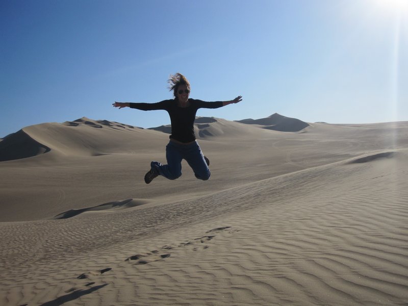 Vic jumping on sand dunes