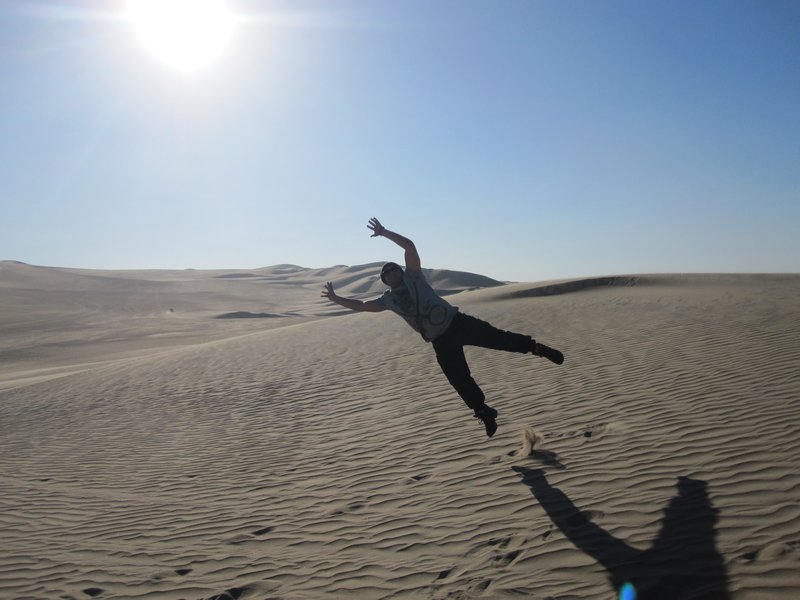 Scott jumping on dunes