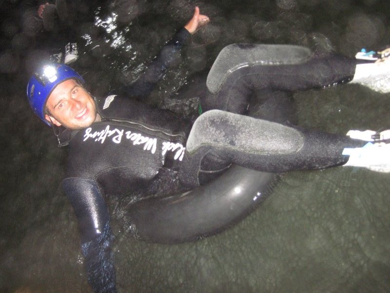 Scott in rubber ring in caves