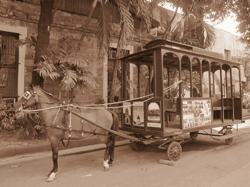 Horse drawn carriage in Intramuros Pk.