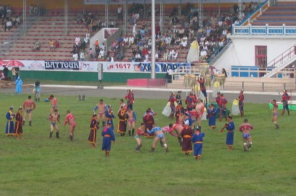 Wrestling in the main stadium at Naadam festival