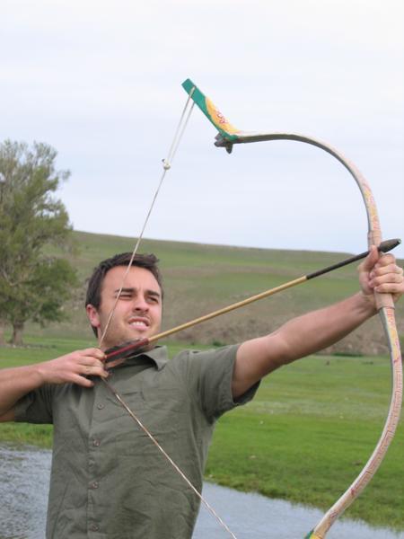 Steve trying his hand at archery