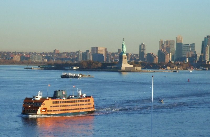 Statten Island ferry passing Statue of Liberty