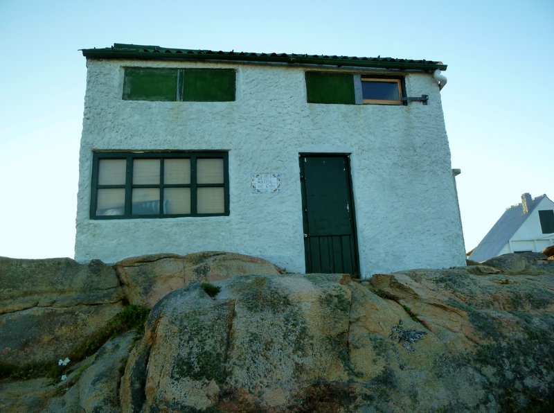 house sitting on rocks
