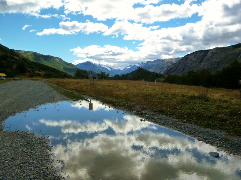 puddle reflections of glorious clouds on the way to Fitz Roy trailhead