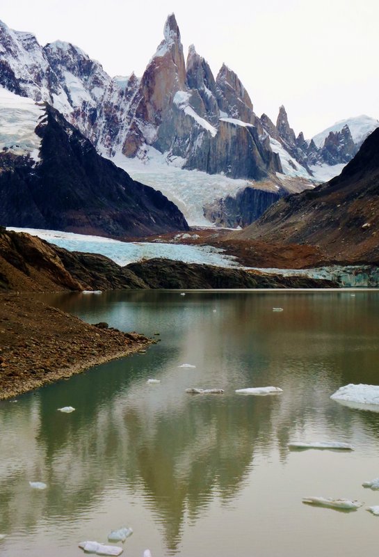 Cerro Torre reglected in its glacial lake