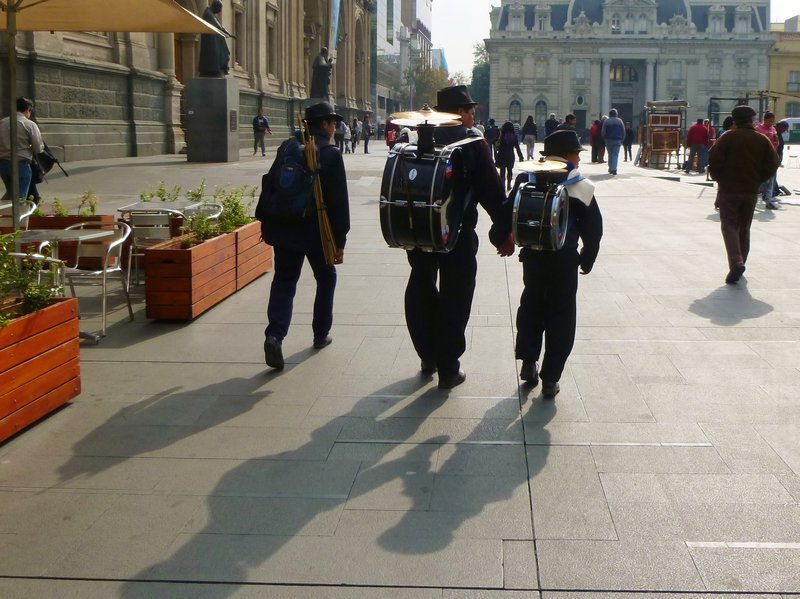 Peruvian musicians heading into the Plaza de Armas to entertain the crowds