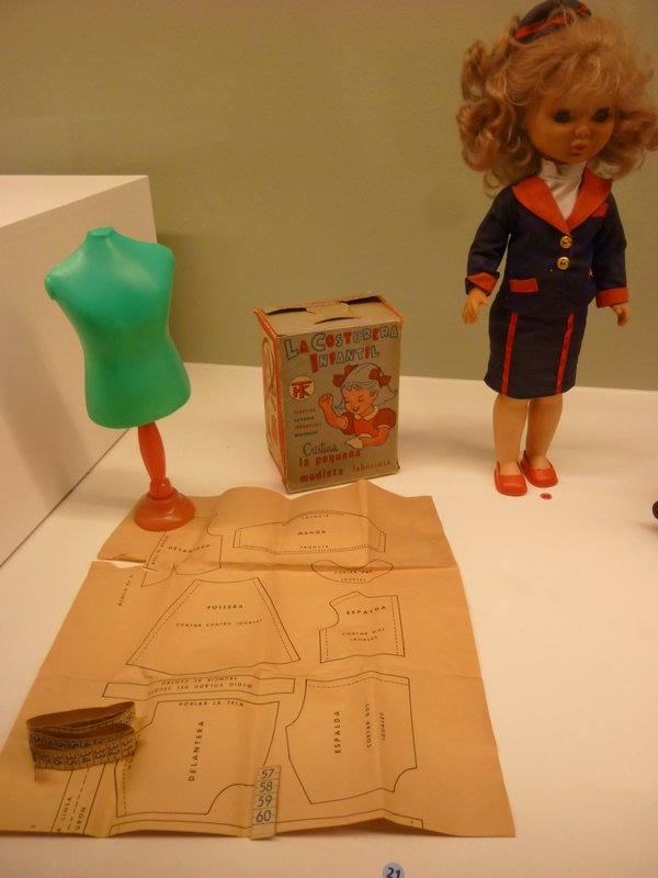 toy exhibition showing how to follow a sewing pattern--we were encouraged to buy dolls' clothes