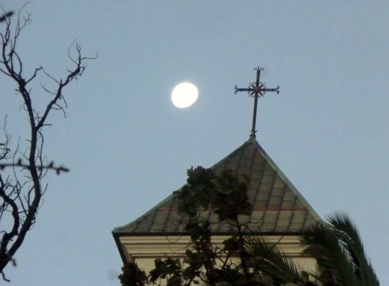 near-full moon over the cathedral