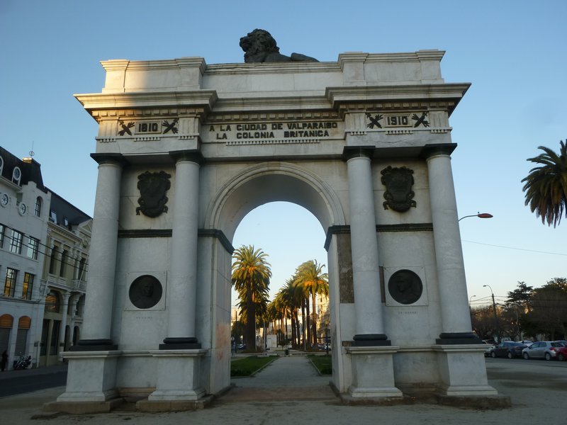Arch of Triumph given by the British and looking down the palm-lined alameda