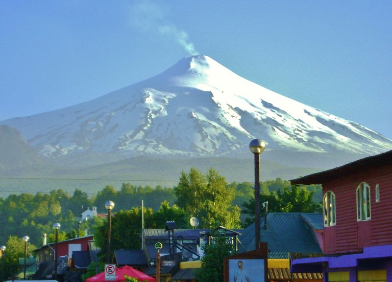  volcano and wooden buildings