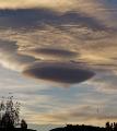 flying saucer clouds and a pair of angel wings