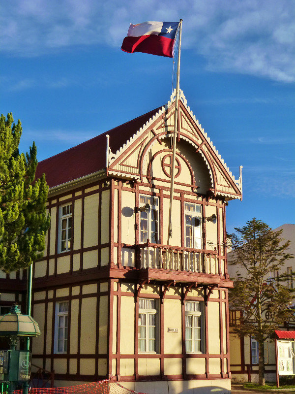 old building with Chilean flag