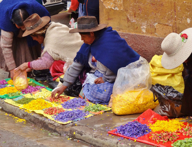women selling flower petals for Dia de las Comadres--Godmother's Day