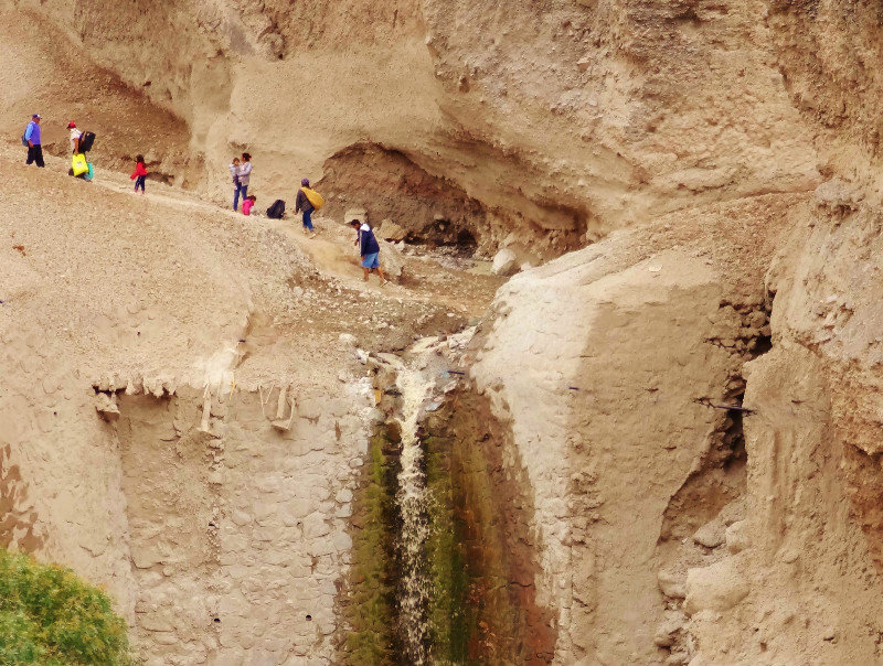 residents daily jump a river that plunges down a cliff