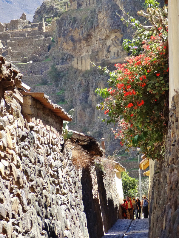 Incan town streets with ruins above