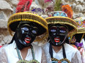 black-faced dancers