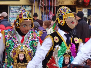 Spanish-faced dancers with El Senor on their chests