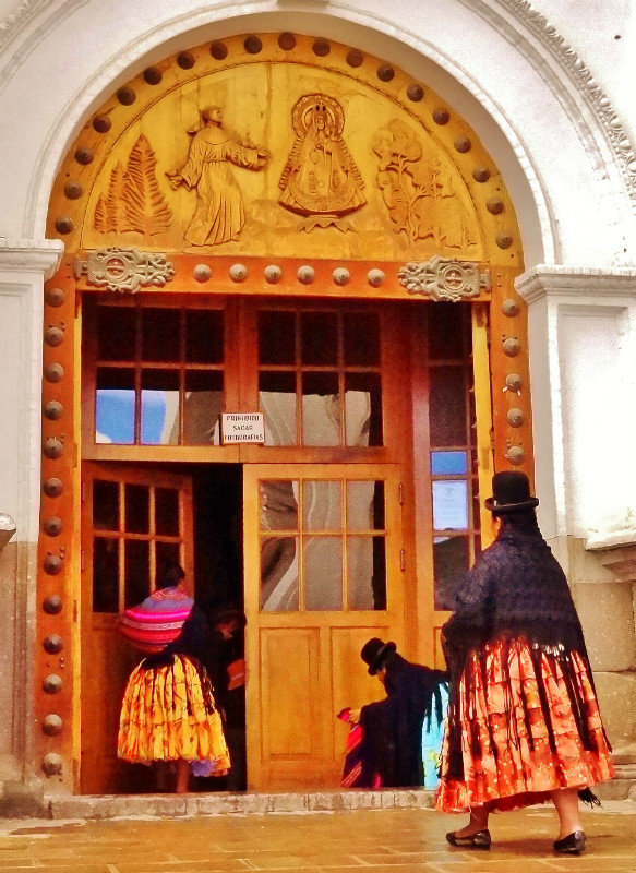 traditional women entering the basilica