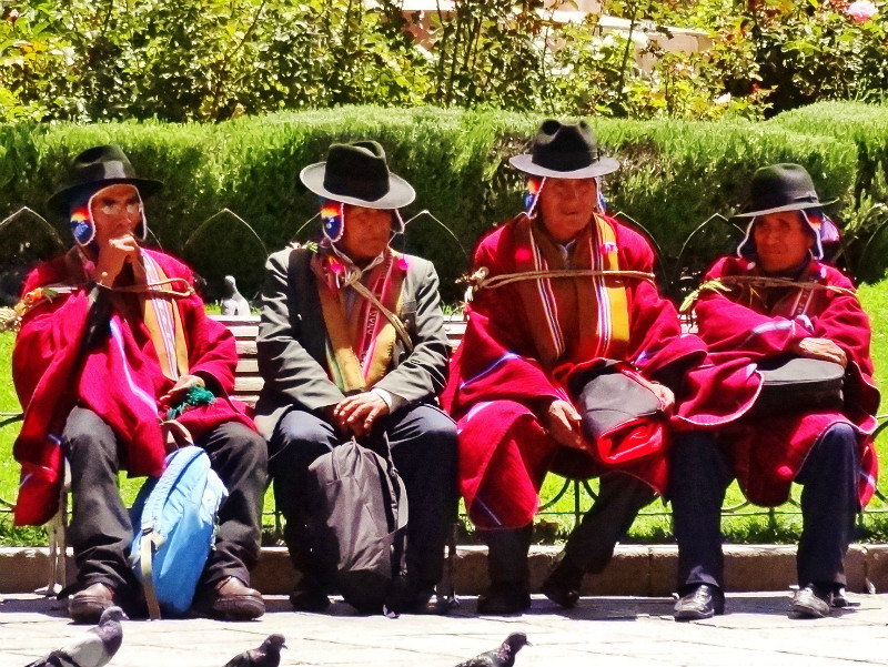 village musicians resting in Plaza Murillo