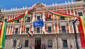 Presidential Palace with Bolivian and rainbow indigenous flags