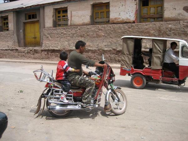 Tibetan on motorcycle