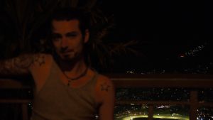 me wih the bright lights of rio in the background