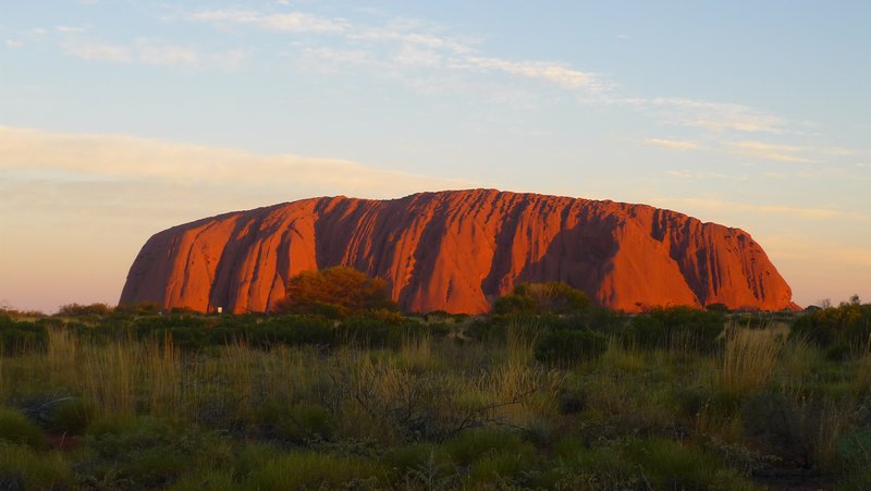 As the sun sets at Uluru