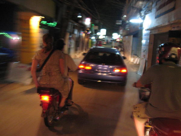 Abbie playing with the local traffic, Phnom Penh