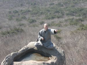 monk on a rock