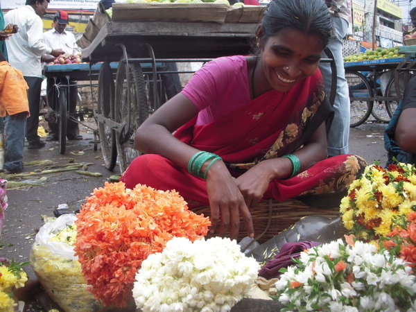 Buying flowers from the ladies in the market