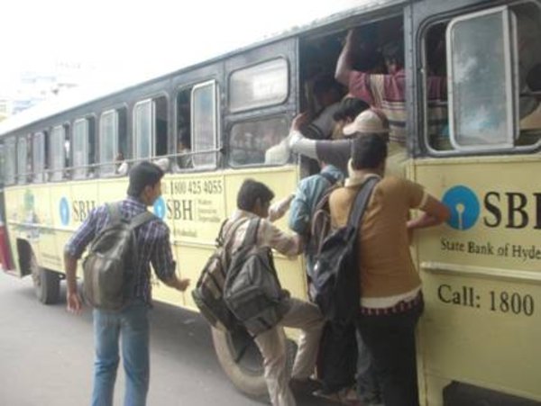 Boys riding a typical bus