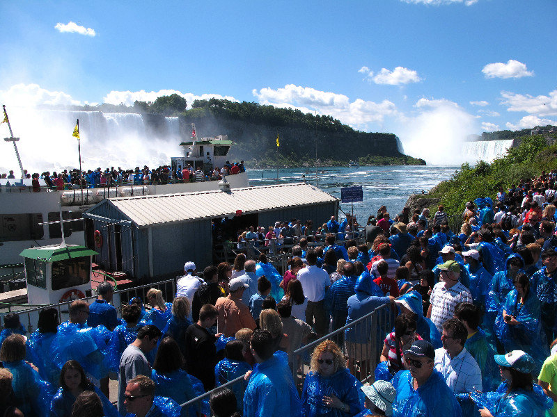 the mad crowd waiting for the "maid of the mist"
