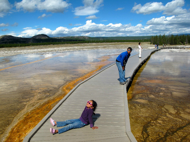 relaxing in the warm steam from Grand Prismatic Spring
