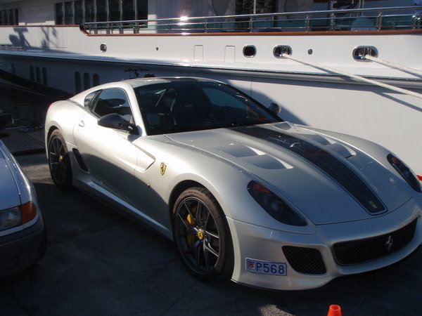 This Ferrari was parked beside one of the boats