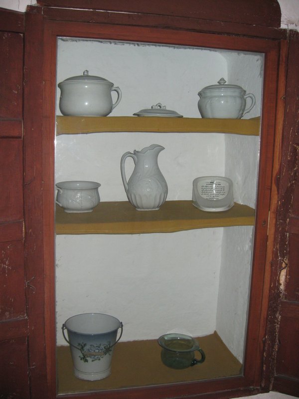 A series of old time chamber pots