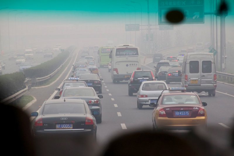 Beijing Traffic and Thick Air.