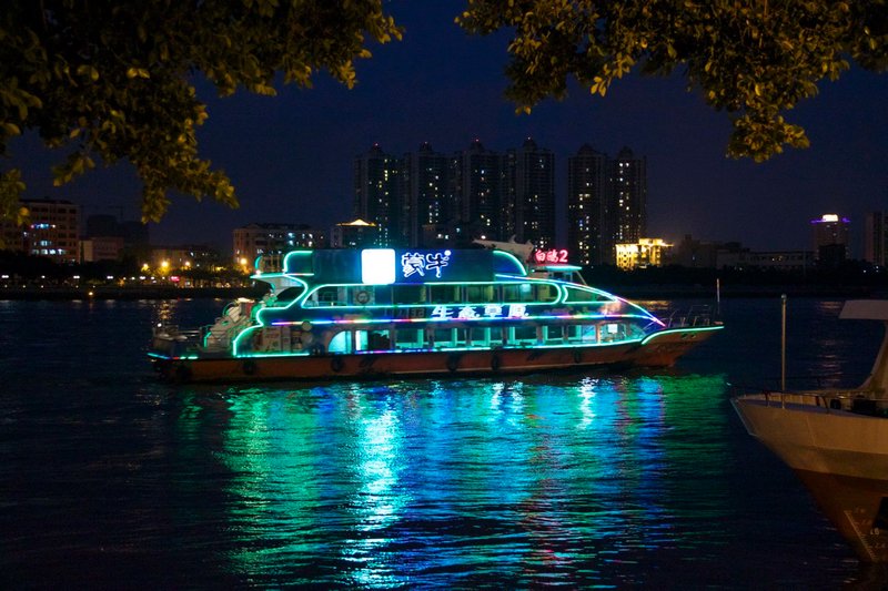 Colorful tour boat on the Pearl River at night. 