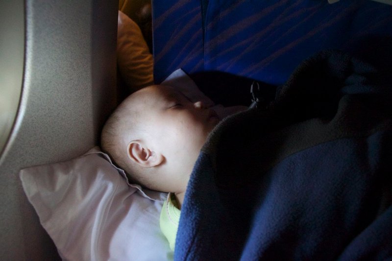 Baby Julia sleeping on the Flight out of China.