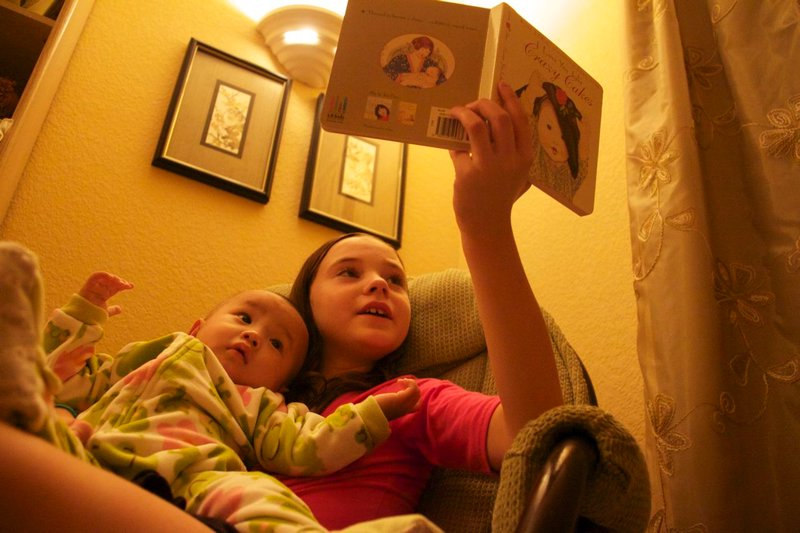 Emma got to read Julia a book tonight before bed.  Julia loved it!